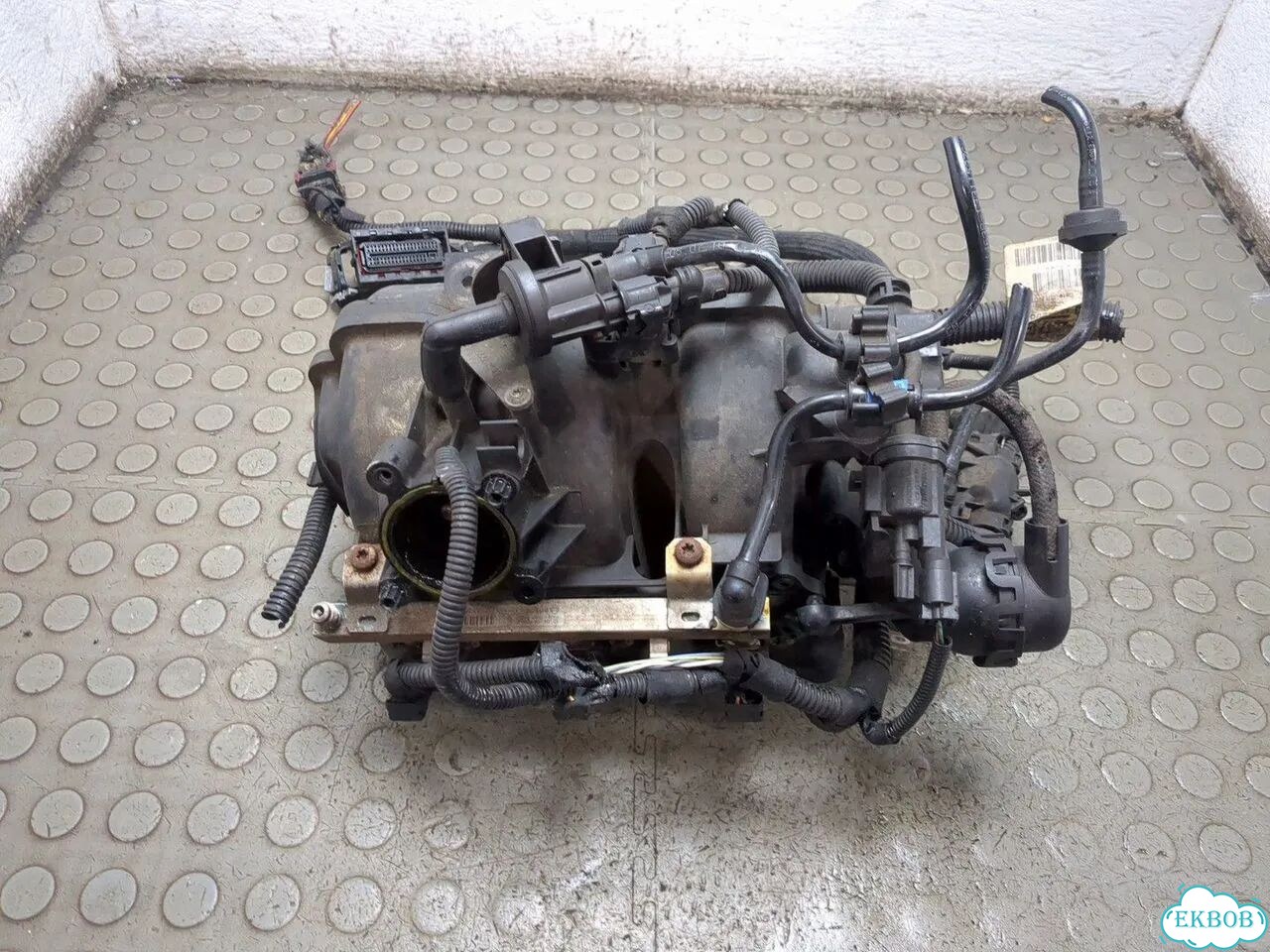 Коллектор впускной Opel Corsa D фото 1
