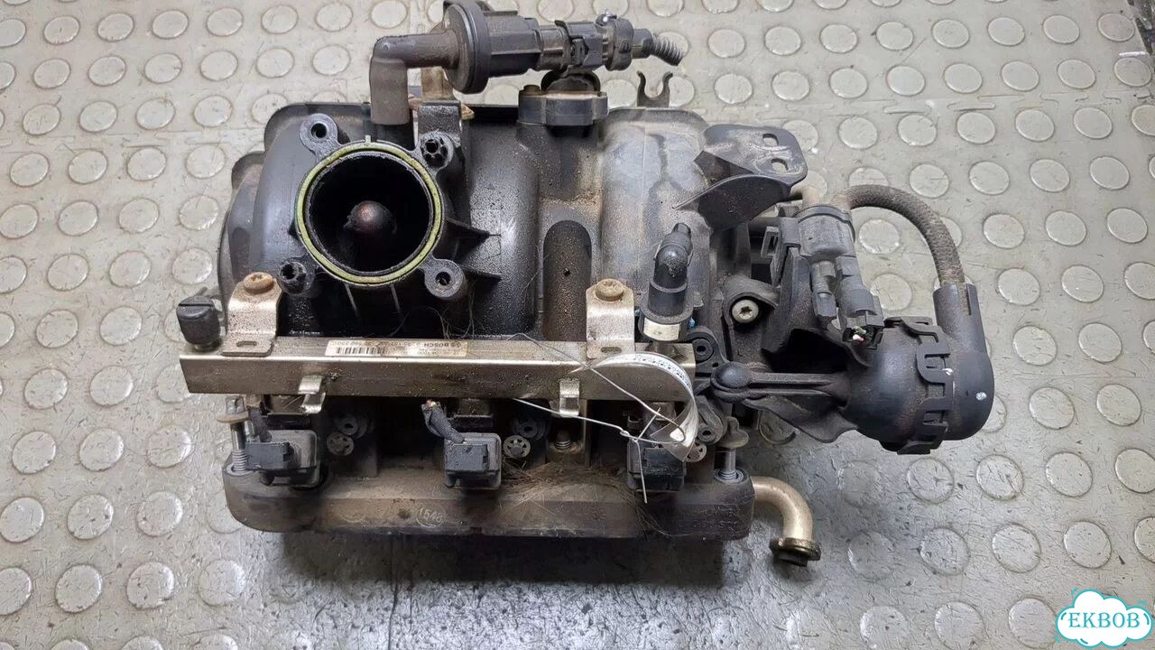 Коллектор впускной Opel Corsa D фото 1