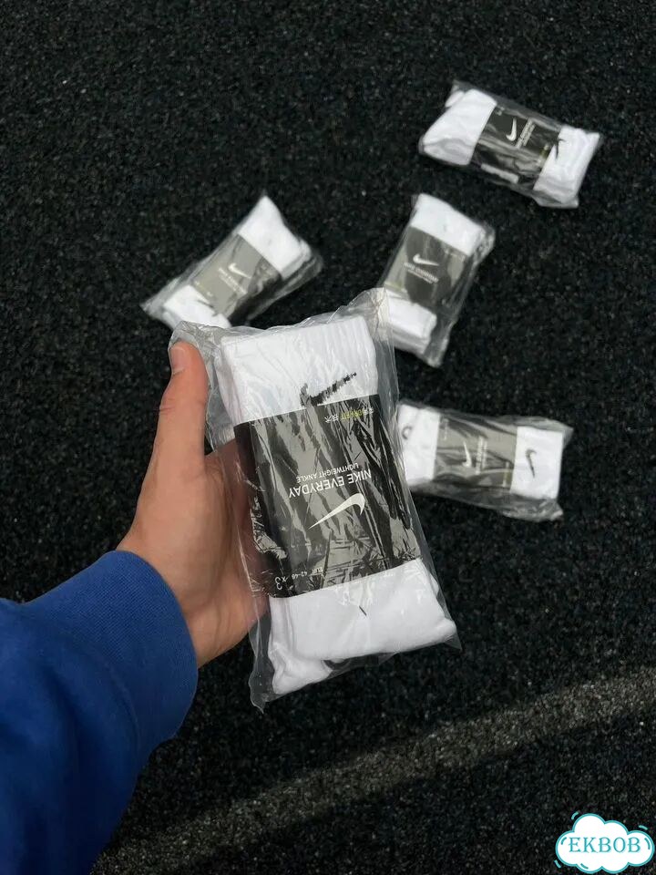 Белые носки nike длинные фото 1