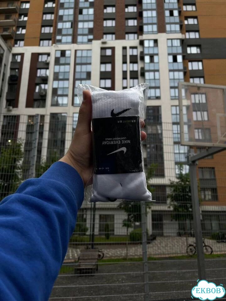 Белые носки nike длинные фото 3