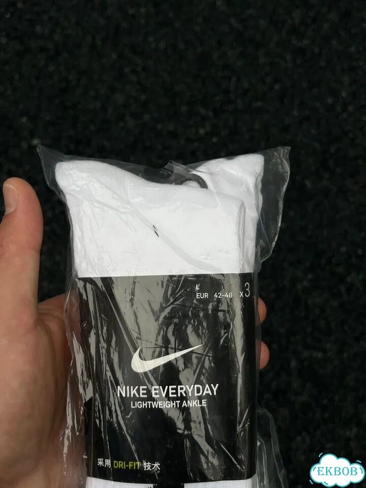 Белые носки nike длинные фото 4