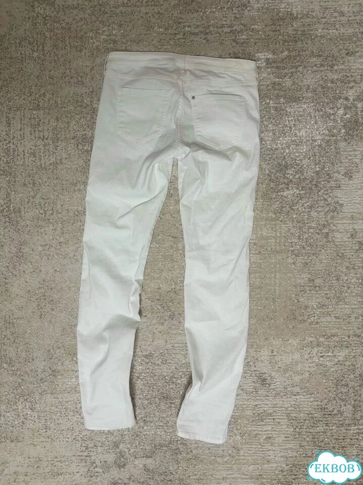 Джинсы slim fit белые фото 2
