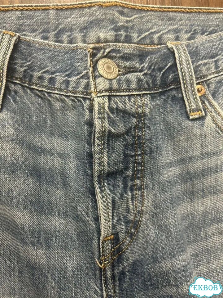 Джинсы женские levis 501 w27 L 32 оригинал рваные фото 3