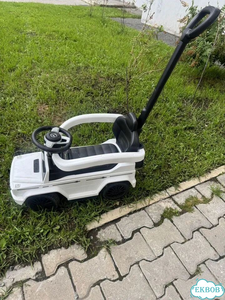 Машинка каталка с родительской ручкой фото 2