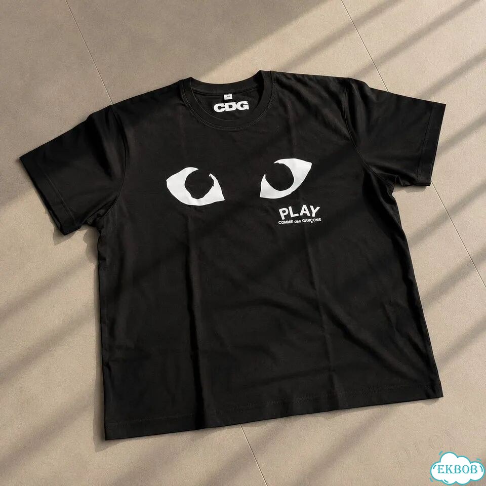 Футболка Comme Des Garcons фото 1