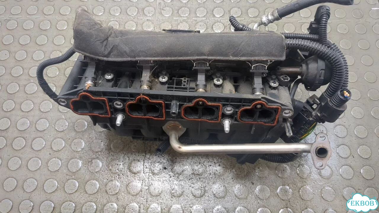 Коллектор впускной Opel Corsa C фото 1